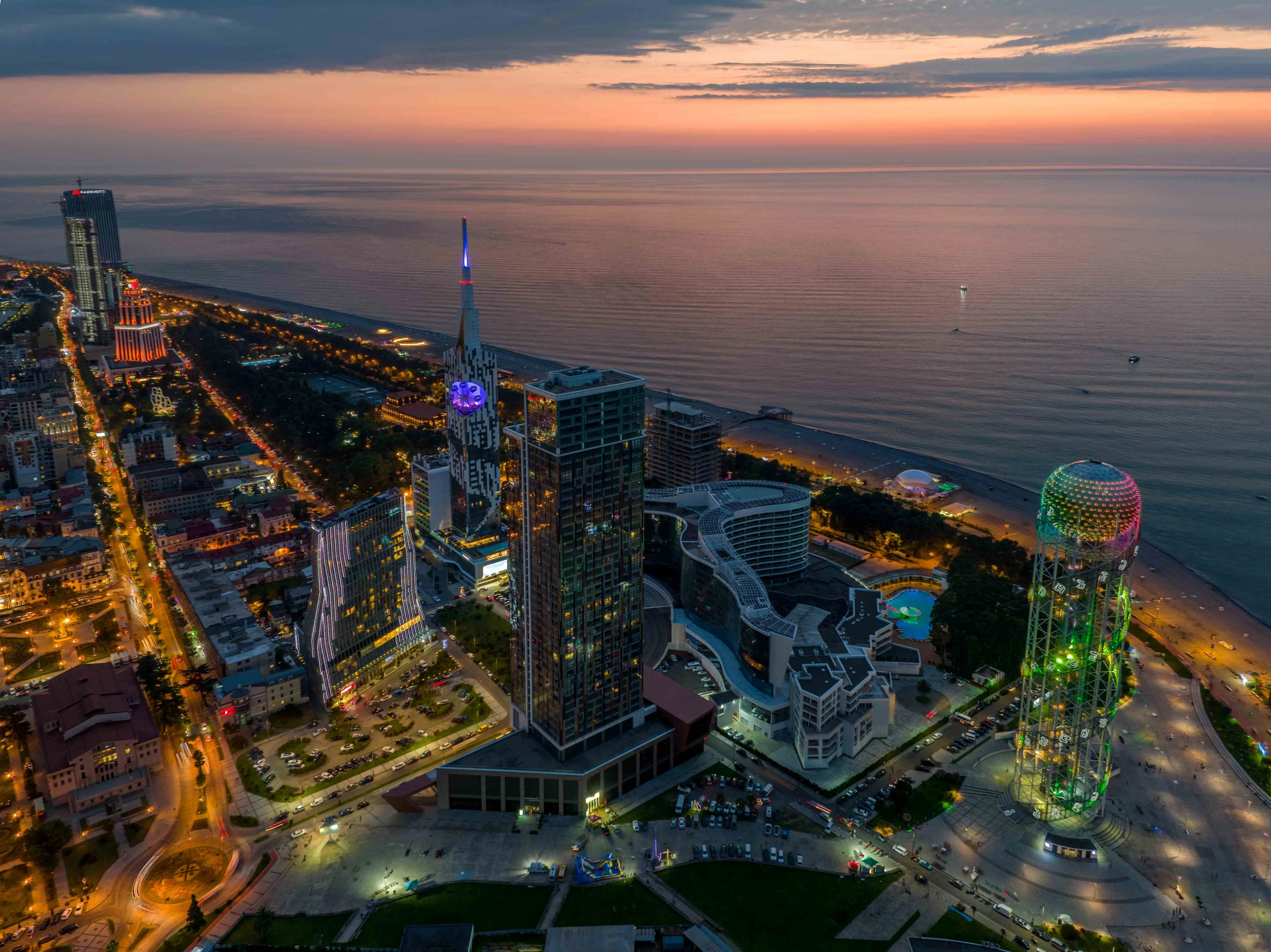  Sunny beaches, a botanical garden, the dolphinarium, dancing fountains, the Alphabetic Tower, the Panoramic Ferris Wheel, the moving sculpture of <span class="text-red-500">Ali and Nino, fascinating museums, Christian churches next to a mosque and a synagogue – all of this and more can be found in Batumi, the magnificent coastal city of Georgia.<br> One <span class="text-red-500">of Georgia’s</span> most popular tourist destinations, Batumi is also your gateway to exploring the rest of the beautiful, historic Ajara. 
