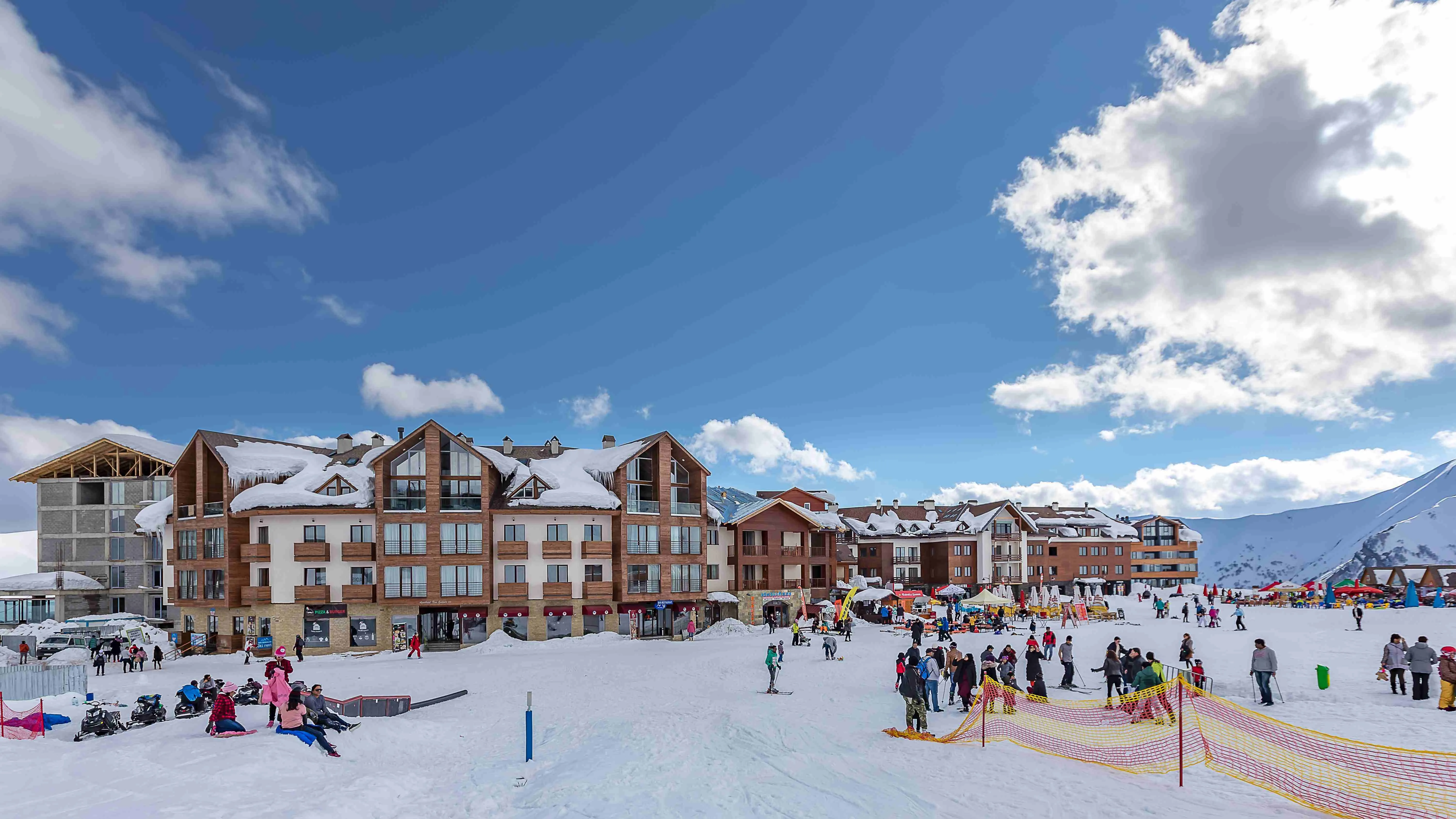  <h4 class="text-lg font-semibold">Gudauri</h4> Georgia is home to many beautiful winter resorts, but <span class="text-red-500">Gudauri</span> is the most well-known. Just 120 km from <span class="text-red-500">Tbilisi</span>, this ski resort is popular for its easy access—you can leave the city and be on the slopes before lunch. With snow for five months a year, Gudauri attracts skiers, adventure seekers, and travelers drawn to the alpine charm of Georgia’s mountains.